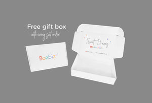 Imagine shows gorgeous free white gift box, with writing on the inside saying "sweet dreams beautiful" Boebiz offer a free gift box with every suit order