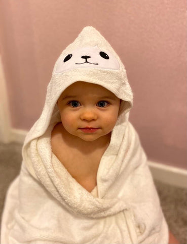 Soft white bamboo hooded towel with sheep face and ears design on the front of the hood